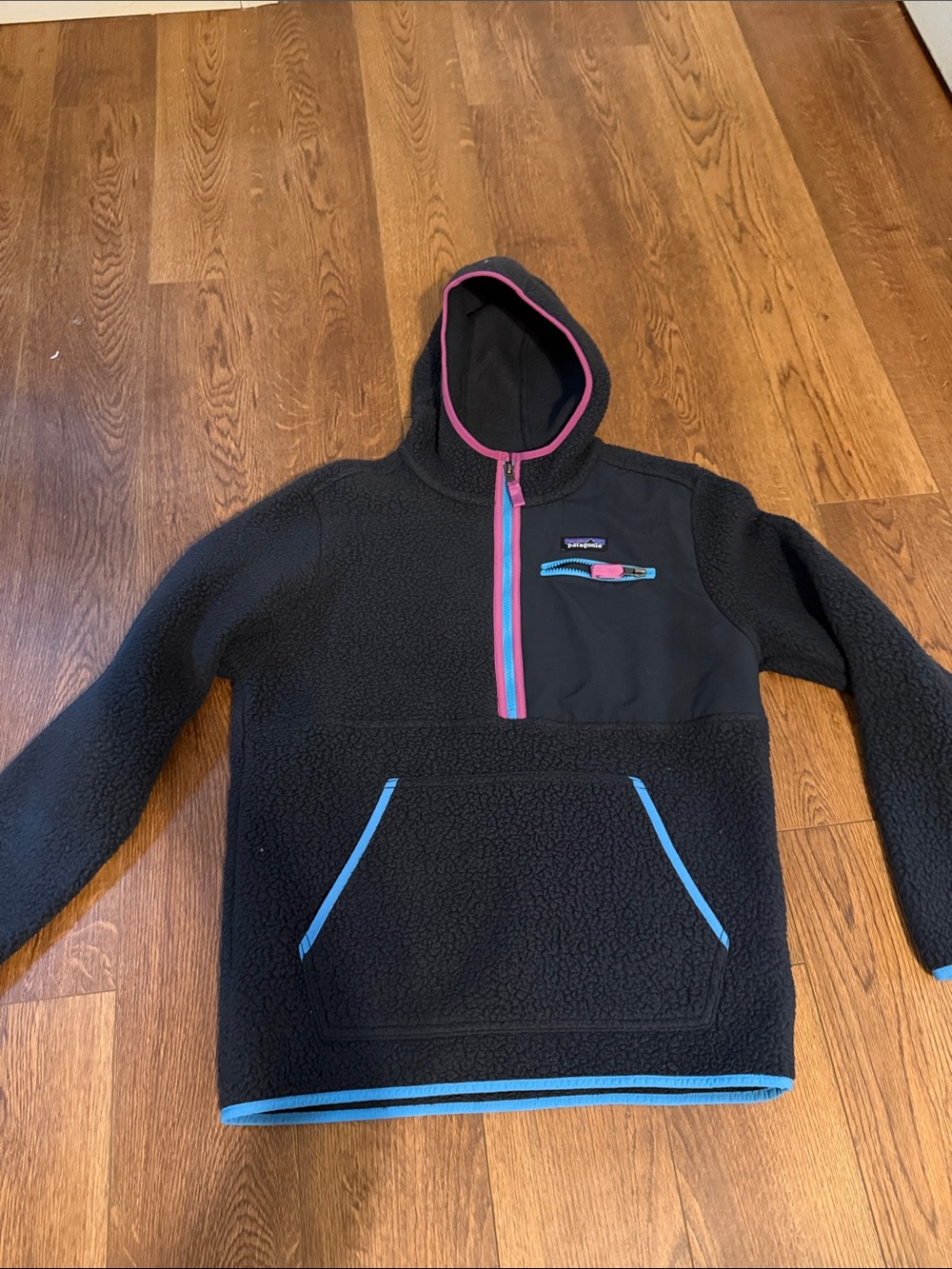 Patagonia women’s Black Sherpa Hoodie with Blue & Pink Trim Size small